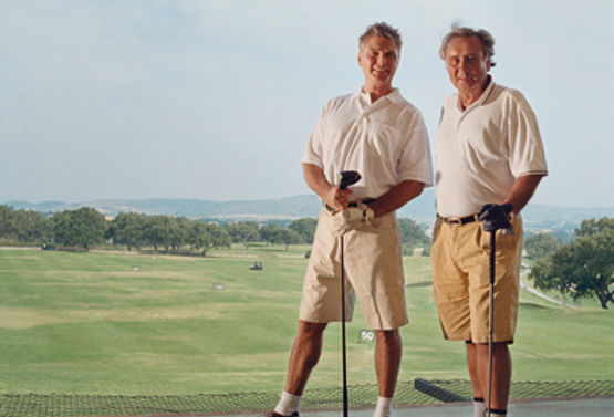 golfers smiling on golf course